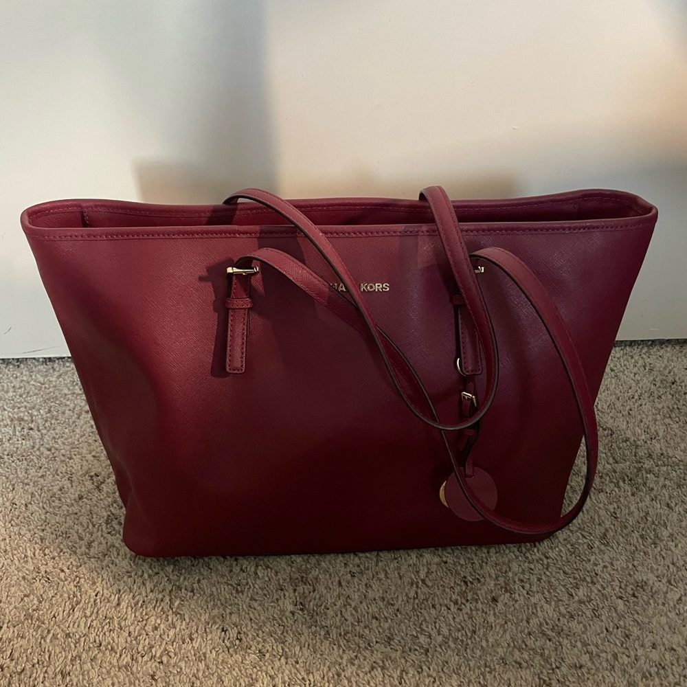 Michael Kors magenta handbag